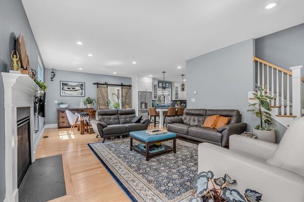 Dining room, Fireplace, Interior, Living room, Pendant Lights, Recessed Lighting, Wood Texture Flooring