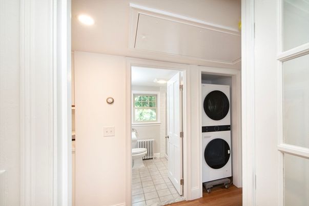 Bathroom, Interior, Recessed Lighting, Utility Closets, Washer, Wood Texture Flooring