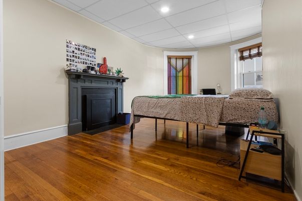 Bedroom, Fireplace, Interior, Recessed Lighting, Wood Texture Flooring