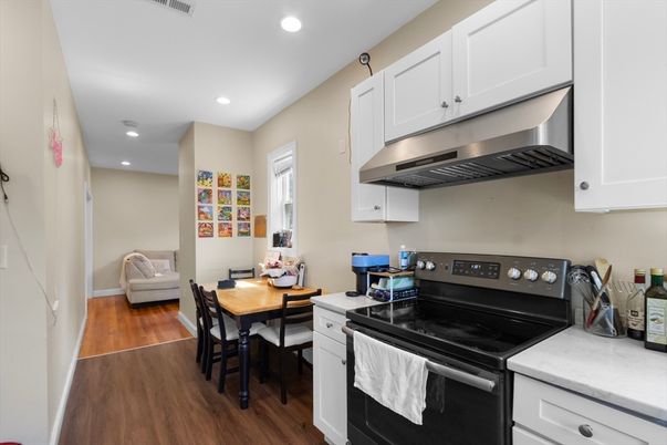Dining room, Interior, Kitchen, Recessed Lighting, Stainless Steel Appliances, Wood Texture Flooring