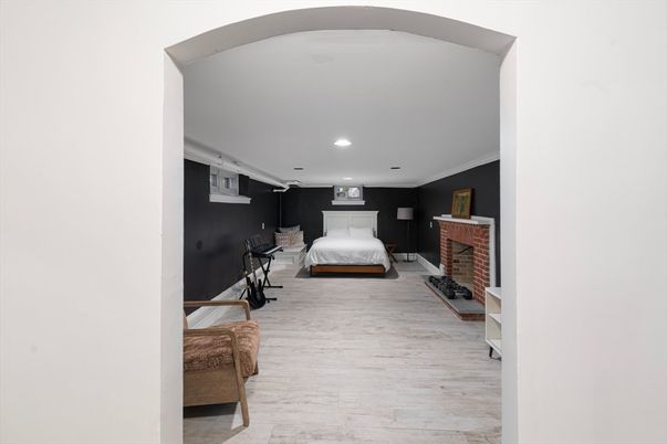 Bedroom, Fireplace, Interior, Recessed Lighting, Wood Texture Flooring