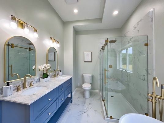 Bathroom, Dual Sink Vanities, Glass Shower, Interior, Marble, Marble Walls, Recessed Lighting