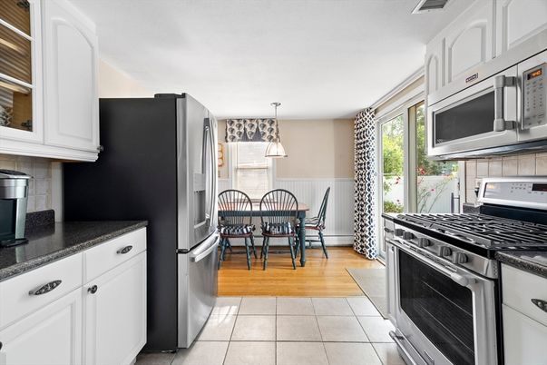 Dining room, Interior, Kitchen, Pendant Lights, Stainless Steel Appliances, Wood Texture Flooring