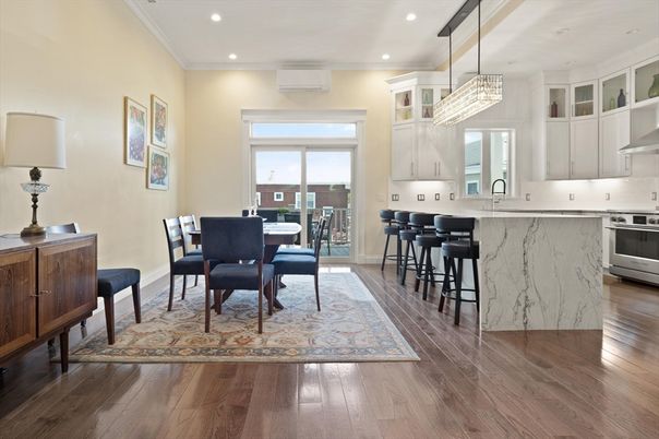 Chandelier, Dining room, Interior, Kitchen, Pendant Lights, Recessed Lighting, Stainless Steel Appliances, Wood Texture Flooring