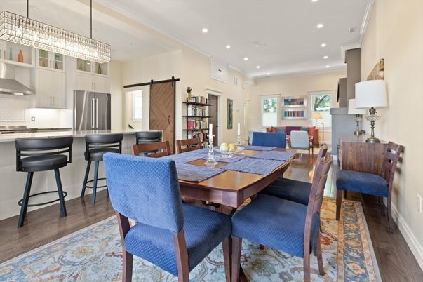 Chandelier, Dining room, Interior, Kitchen, Recessed Lighting, Stainless Steel Appliances, Wood Texture Flooring