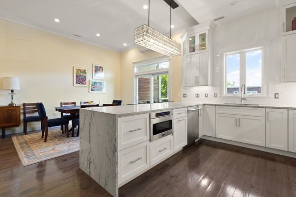 Chandelier, Dining room, Interior, Kitchen, Recessed Lighting, Stainless Steel Appliances, Wood Texture Flooring