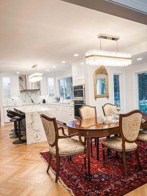 Chandelier, Dining room, Interior, Kitchen, Marble Walls, Pendant Lights, Recessed Lighting, Stainless Steel Appliances, Wood Texture Flooring
