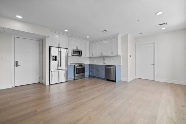 Interior, Kitchen, Recessed Lighting, Stainless Steel Appliances, Wood Texture Flooring