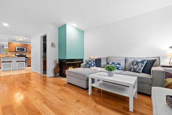Fireplace, Interior, Kitchen, Living room, Recessed Lighting, Wood Texture Flooring