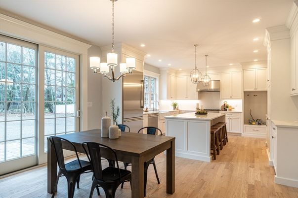 Chandelier, Dining room, Interior, Kitchen, Pendant Lights, Recessed Lighting, Stainless Steel Appliances, Wood Texture Flooring