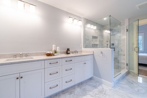 Bathroom, Dual Sink Vanities, Glass Shower, Interior, Marble, Marble Walls, Recessed Lighting