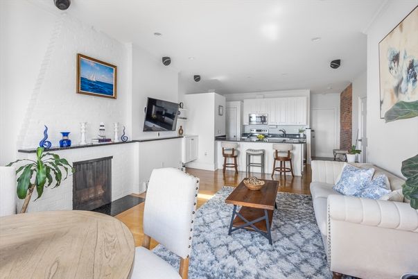 Dining room, Fireplace, Interior, Kitchen, Living room, Recessed Lighting, Stainless Steel Appliances, Wood Texture Flooring