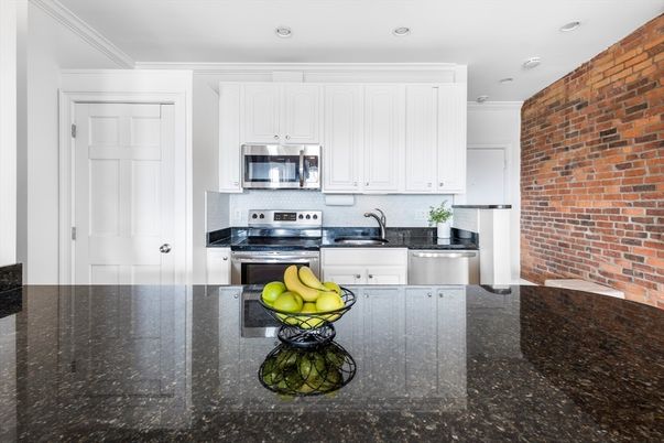 Interior, Kitchen, Recessed Lighting, Stainless Steel Appliances, Stone Walls
