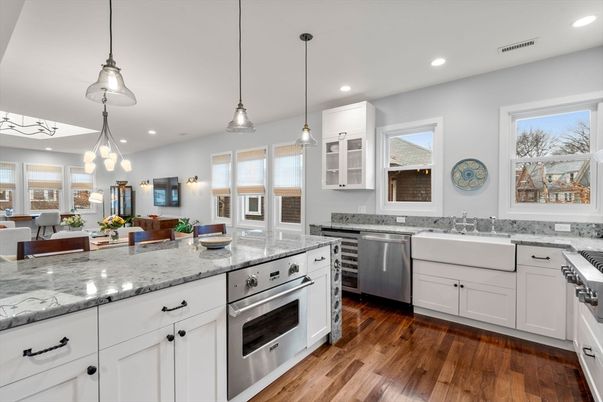 Dining room, Interior, Kitchen, Pendant Lights, Recessed Lighting, Stainless Steel Appliances, Wood Texture Flooring