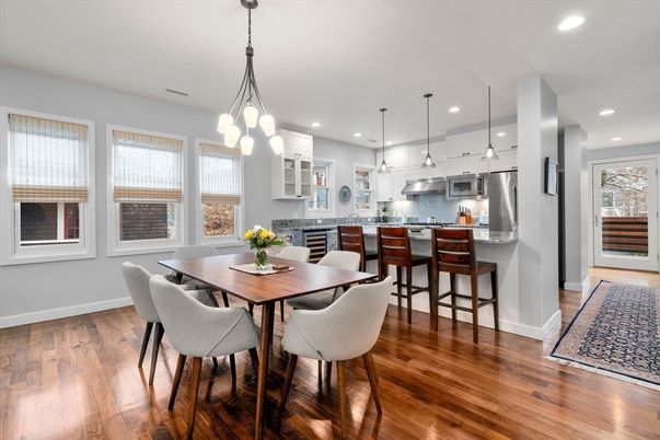Dining room, Interior, Kitchen, Pendant Lights, Recessed Lighting, Stainless Steel Appliances, Wood Texture Flooring