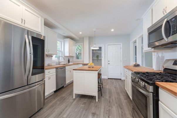 Interior, Kitchen, Pendant Lights, Recessed Lighting, Stainless Steel Appliances, Wood Texture Flooring