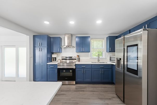Interior, Kitchen, Recessed Lighting, Stainless Steel Appliances, Wood Texture Flooring