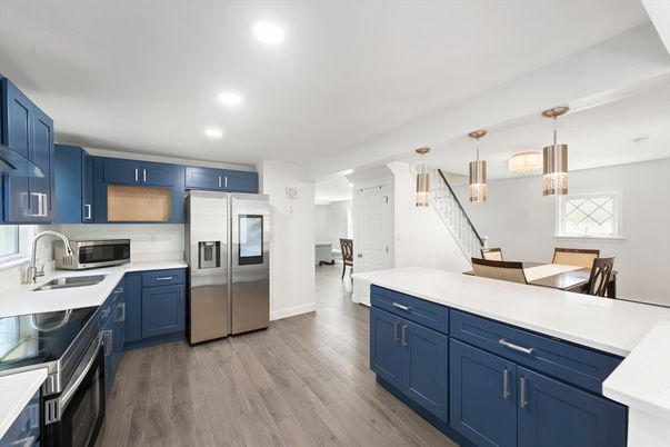 Interior, Kitchen, Pendant Lights, Recessed Lighting, Stainless Steel Appliances, Wood Texture Flooring