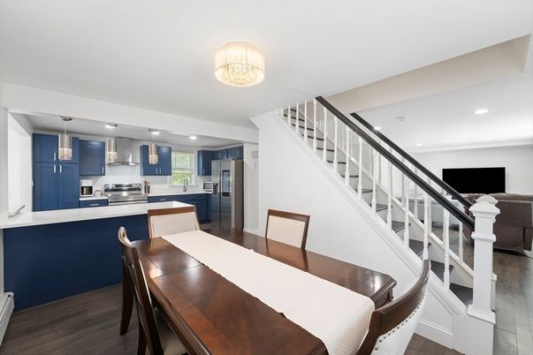 Dining room, Interior, Kitchen, Pendant Lights, Recessed Lighting, Stainless Steel Appliances, Wood Texture Flooring