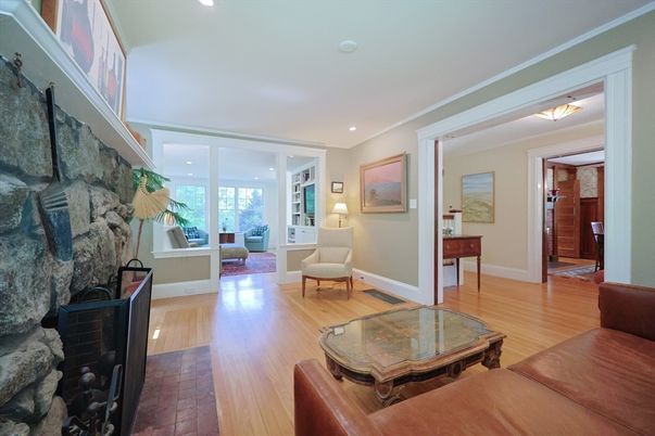 Fireplace, Interior, Living room, Recessed Lighting, Stone Walls, Wood Texture Flooring