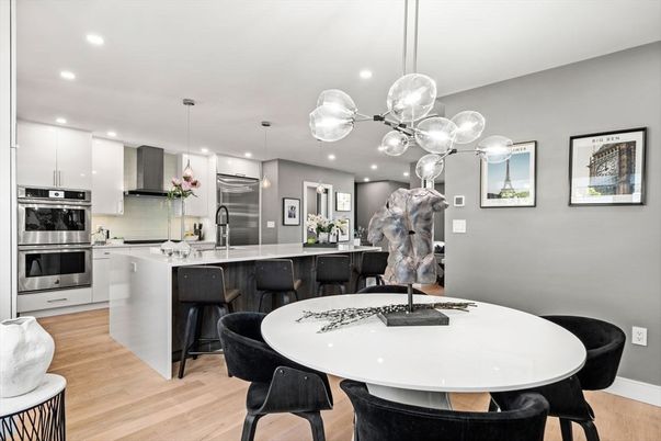 Dining room, Interior, Kitchen, Pendant Lights, Recessed Lighting, Stainless Steel Appliances, Wood Texture Flooring