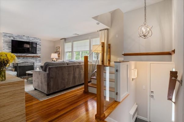 Fireplace, Interior, Living room, Pendant Lights, Stone Walls, Wood Texture Flooring