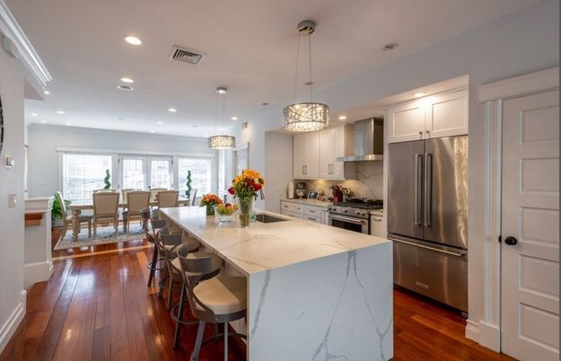 Dining room, Interior, Kitchen, Pendant Lights, Recessed Lighting, Stainless Steel Appliances, Wood Texture Flooring