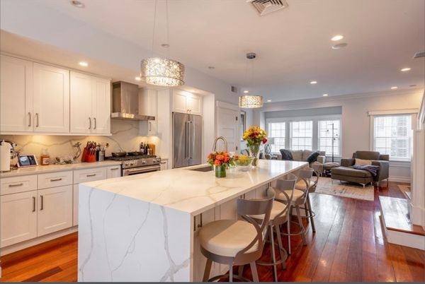 Chandelier, Interior, Kitchen, Living room, Pendant Lights, Recessed Lighting, Stainless Steel Appliances, Wood Texture Flooring
