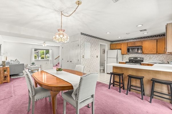 Chandelier, Dining room, Interior, Kitchen, Living room, Pendant Lights, Recessed Lighting, Stainless Steel Appliances