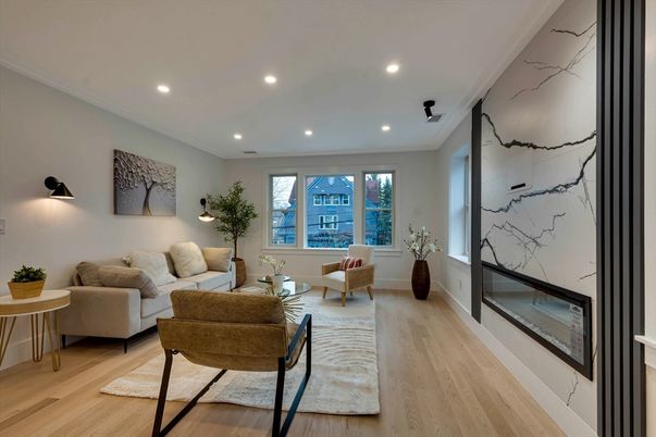 Fireplace, Interior, Living room, Marble Walls, Recessed Lighting, Wood Texture Flooring