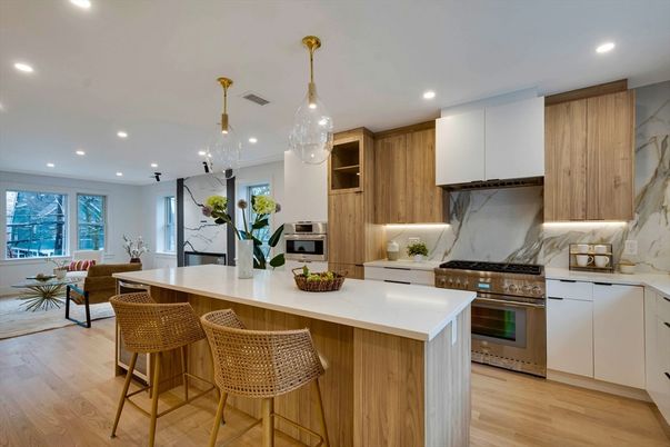 Interior, Kitchen, Marble Walls, Pendant Lights, Recessed Lighting, Stainless Steel Appliances, Wood Texture Flooring