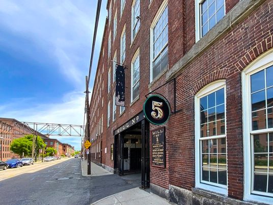 Exterior, Facade, Brick Facade, Condo Building