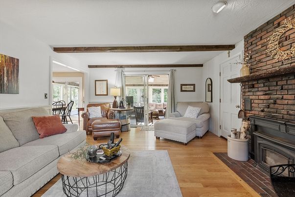 Dining room, Fireplace, Interior, Living room, Stone Walls, Wooden Beams, Wood Texture Flooring