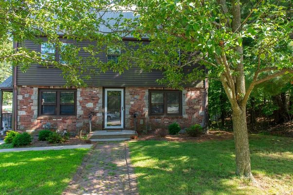 Exterior, Facade, Brick Facade, Log Home