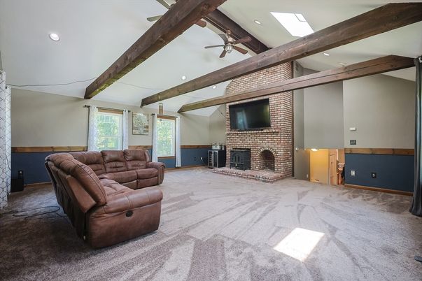 Empty room, Fireplace, Interior, Living room, Recessed Lighting, Stone Walls, Wooden Beams