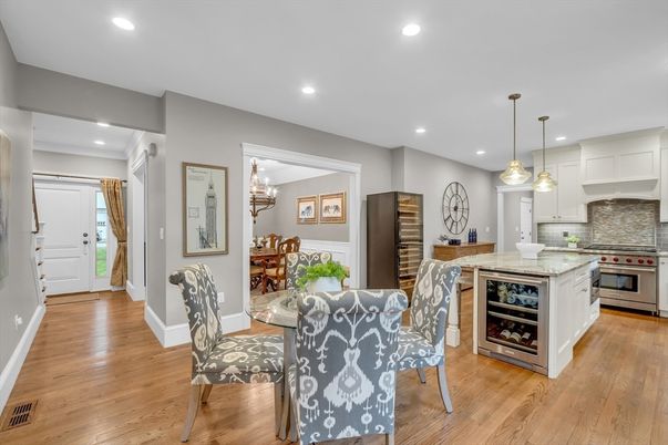 Dining room, Interior, Kitchen, Pendant Lights, Recessed Lighting, Stainless Steel Appliances, Wood Texture Flooring