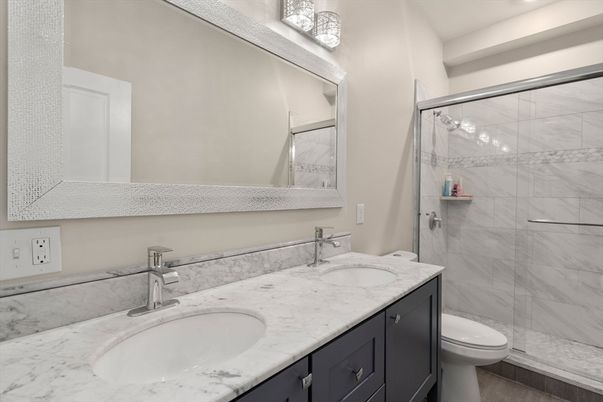 Bathroom, Dual Sink Vanities, Glass Shower, Interior, Marble Walls