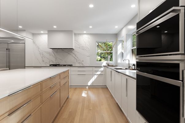 Interior, Kitchen, Marble Walls, Recessed Lighting, Stainless Steel Appliances, Wood Texture Flooring