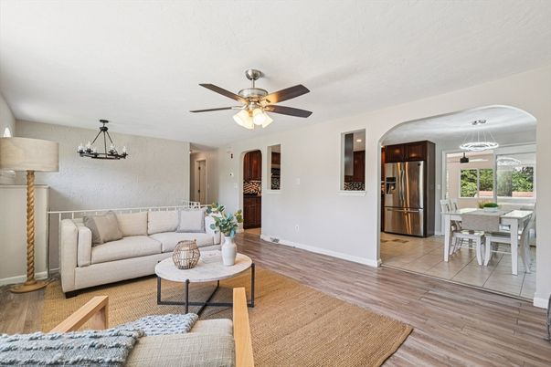 Chandelier, Dining room, Interior, Kitchen, Living room, Pendant Lights, Stainless Steel Appliances, Wood Texture Flooring