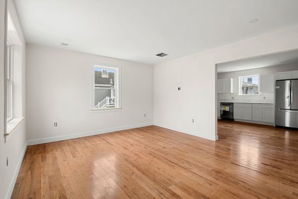 Empty room, Interior, Kitchen, Stainless Steel Appliances, Wood Texture Flooring