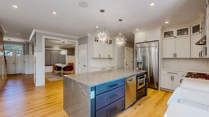 Chandelier, Dining room, Interior, Kitchen, Pendant Lights, Recessed Lighting, Stainless Steel Appliances, Wood Texture Flooring