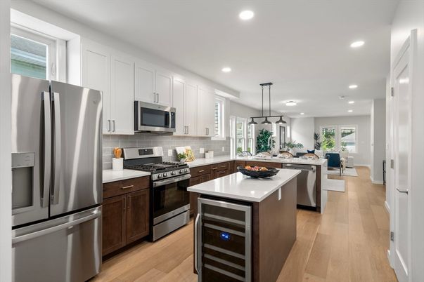 Dining room, Interior, Kitchen, Pendant Lights, Recessed Lighting, Stainless Steel Appliances, Wood Texture Flooring