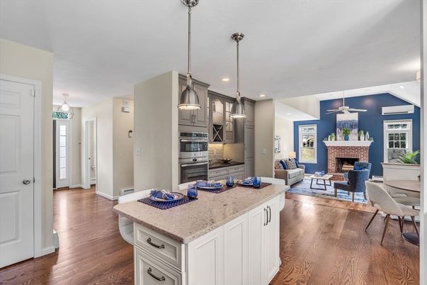 Dining room, Fireplace, Interior, Kitchen, Living room, Pendant Lights, Recessed Lighting, Stainless Steel Appliances, Wood Texture Flooring