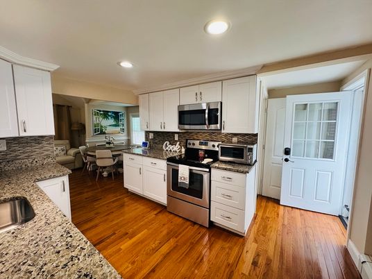 Dining room, Interior, Kitchen, Recessed Lighting, Stainless Steel Appliances, Wood Texture Flooring
