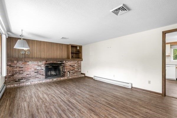 Empty room, Fireplace, Interior, Pendant Lights, Stone Walls, Wood Texture Flooring