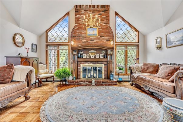 Chandelier, Fireplace, Interior, Living room, Piano, Stone Walls, Wood Texture Flooring