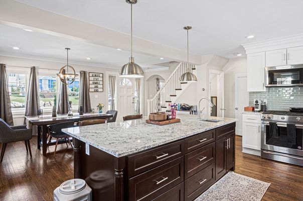 Dining room, Interior, Kitchen, Pendant Lights, Recessed Lighting, Stainless Steel Appliances, Wood Texture Flooring