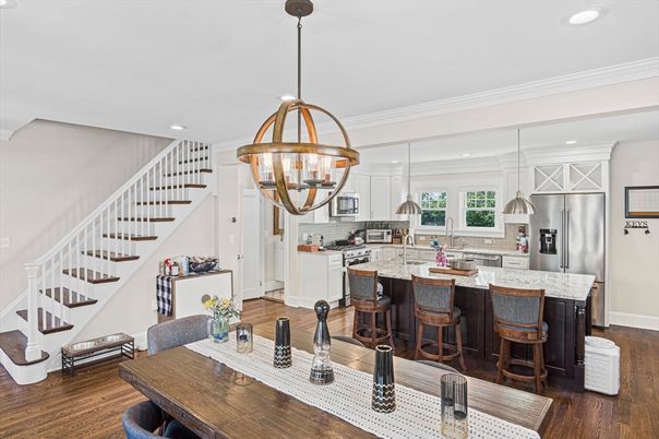 Chandelier, Dining room, Interior, Kitchen, Pendant Lights, Recessed Lighting, Stainless Steel Appliances, Wood Texture Flooring