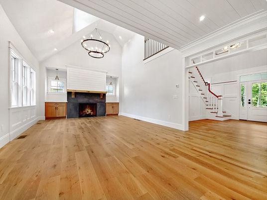 Chandelier, Empty room, Fireplace, Interior, Recessed Lighting, Wood Texture Flooring
