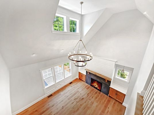 Chandelier, Empty room, Fireplace, Interior, Pendant Lights, Recessed Lighting, Wood Texture Flooring